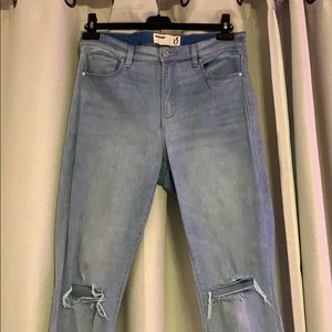 GARAGE LIGHT WASH RIPPED JEANS